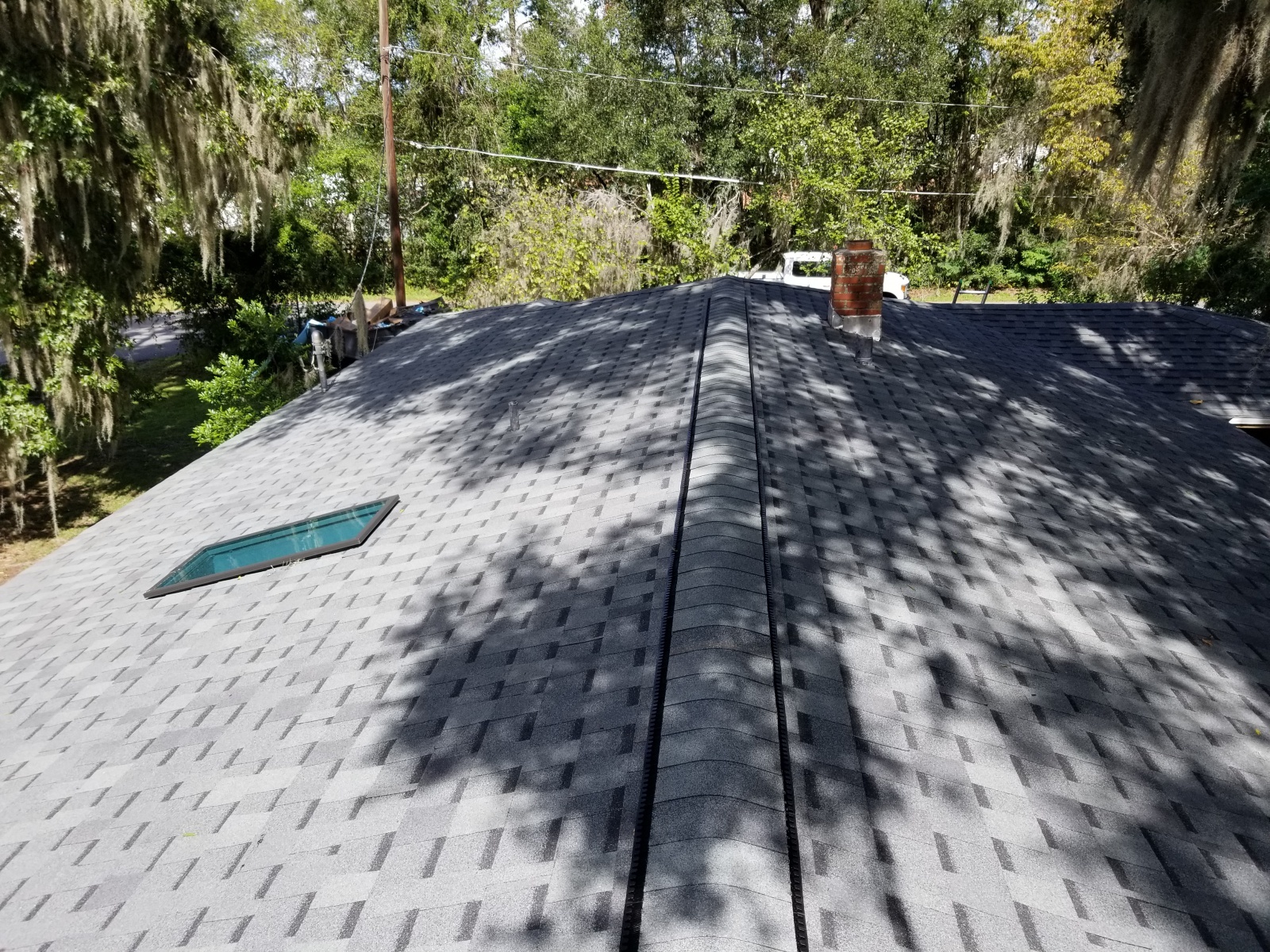 Shingle roof with skylight