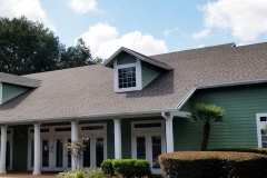 This commercial building has Atlas Pinnacle Pristine shingles in the color Weathered Shadow.